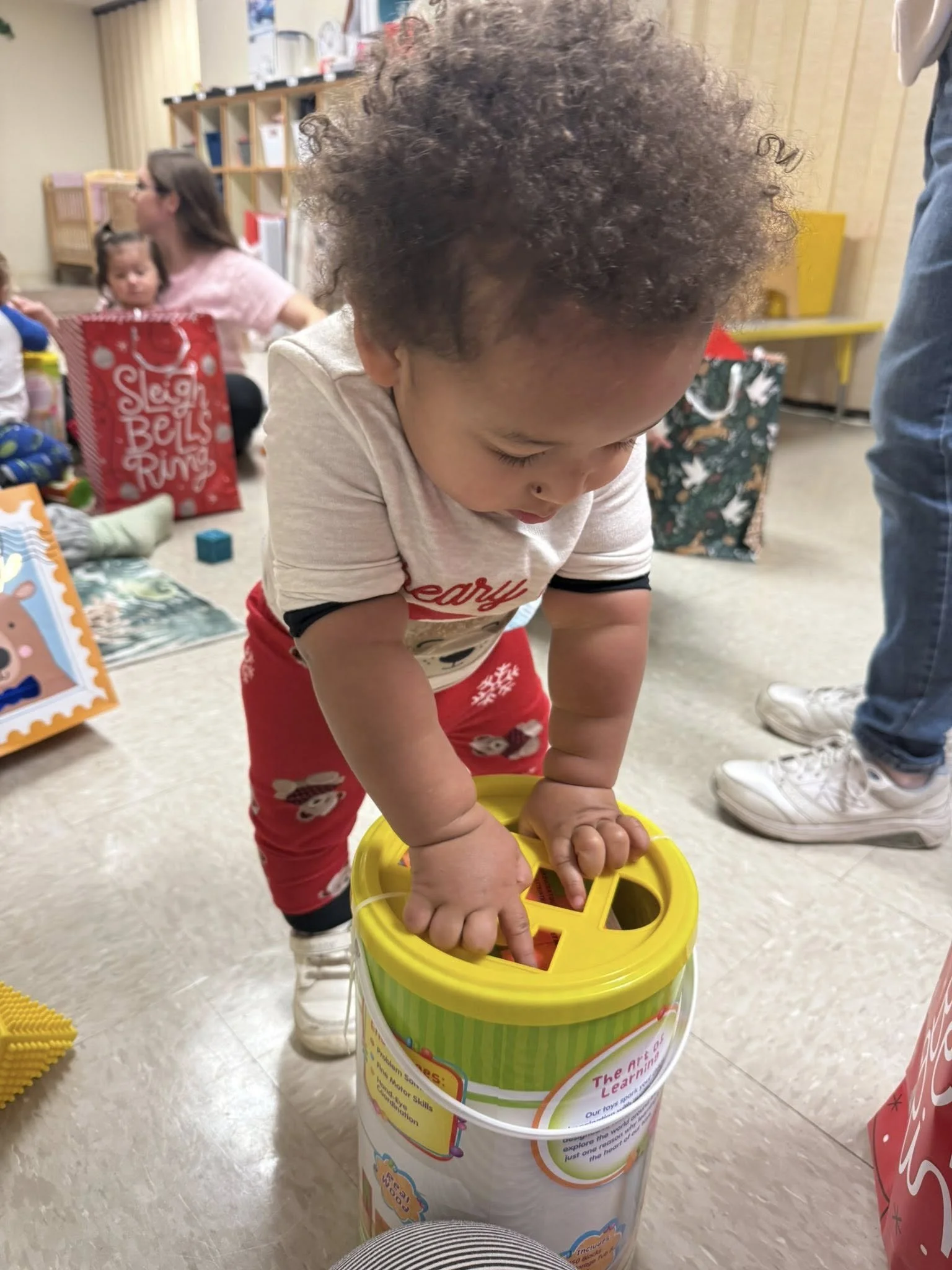 BV 2026 Jan toddler with toy.jpg