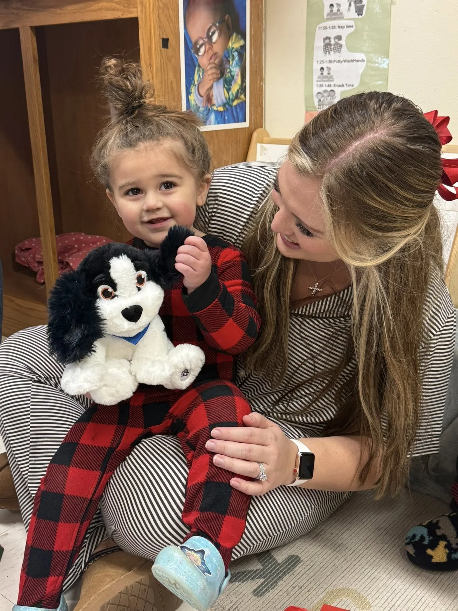 BV 2026 Briley holding girl with toy.jpg