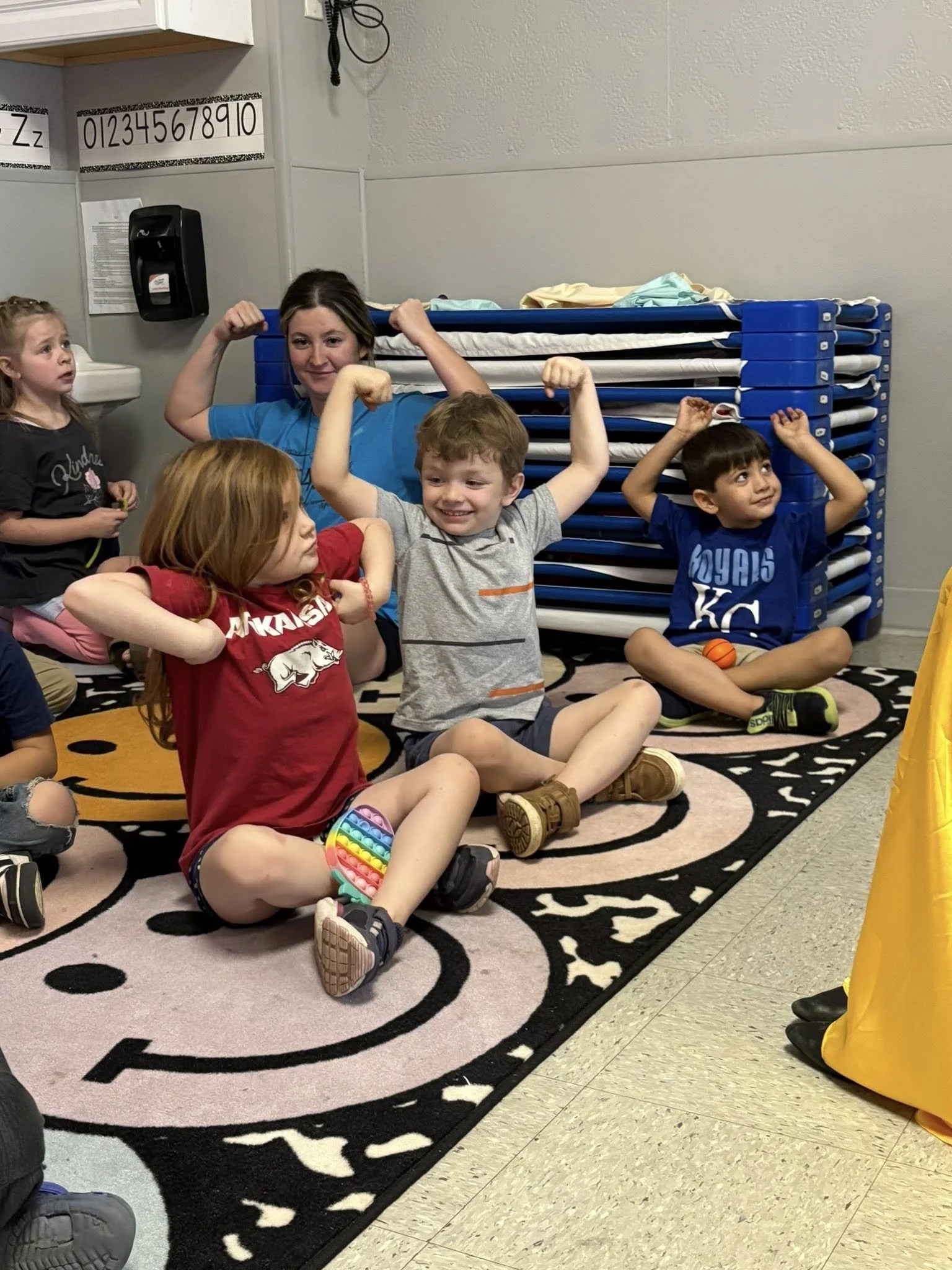 Harrison class doing strong arms.jpg