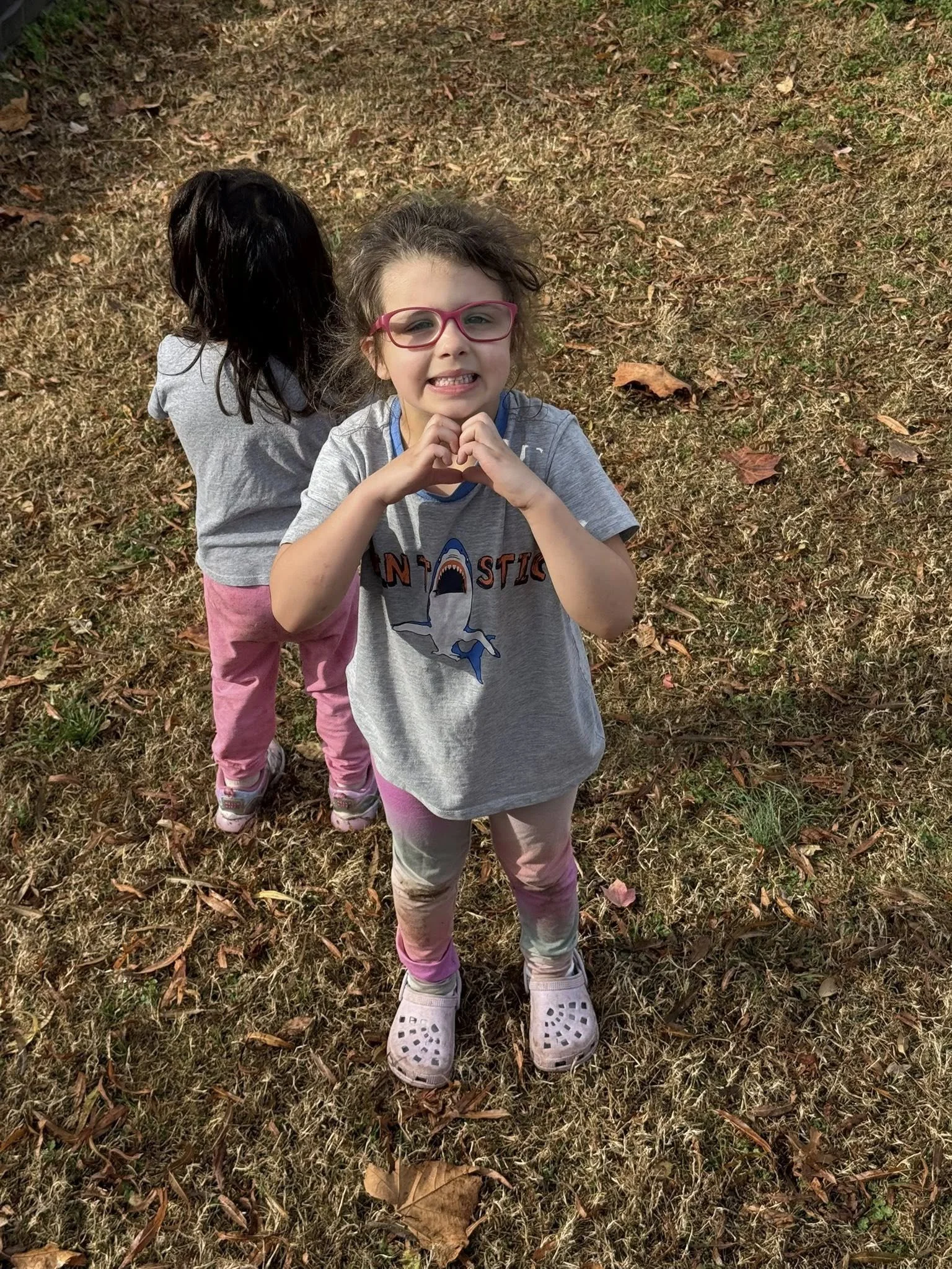 Huntsville girl showing heart sign.jpg
