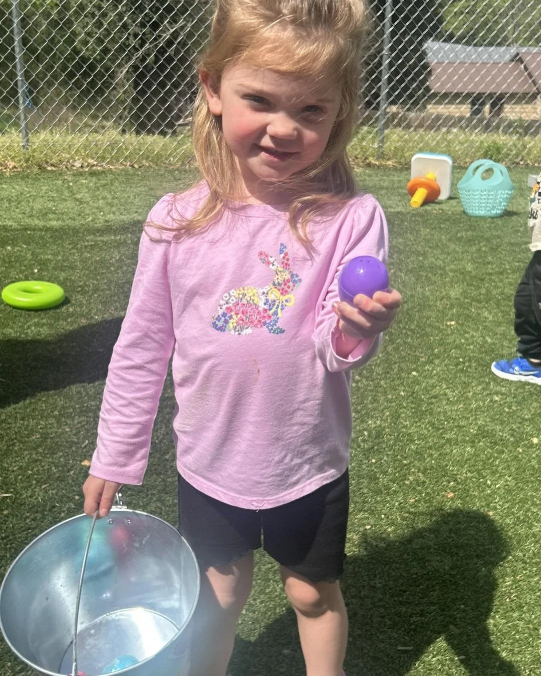 Jasper April 2026 girl showing her Easter egg.jpg