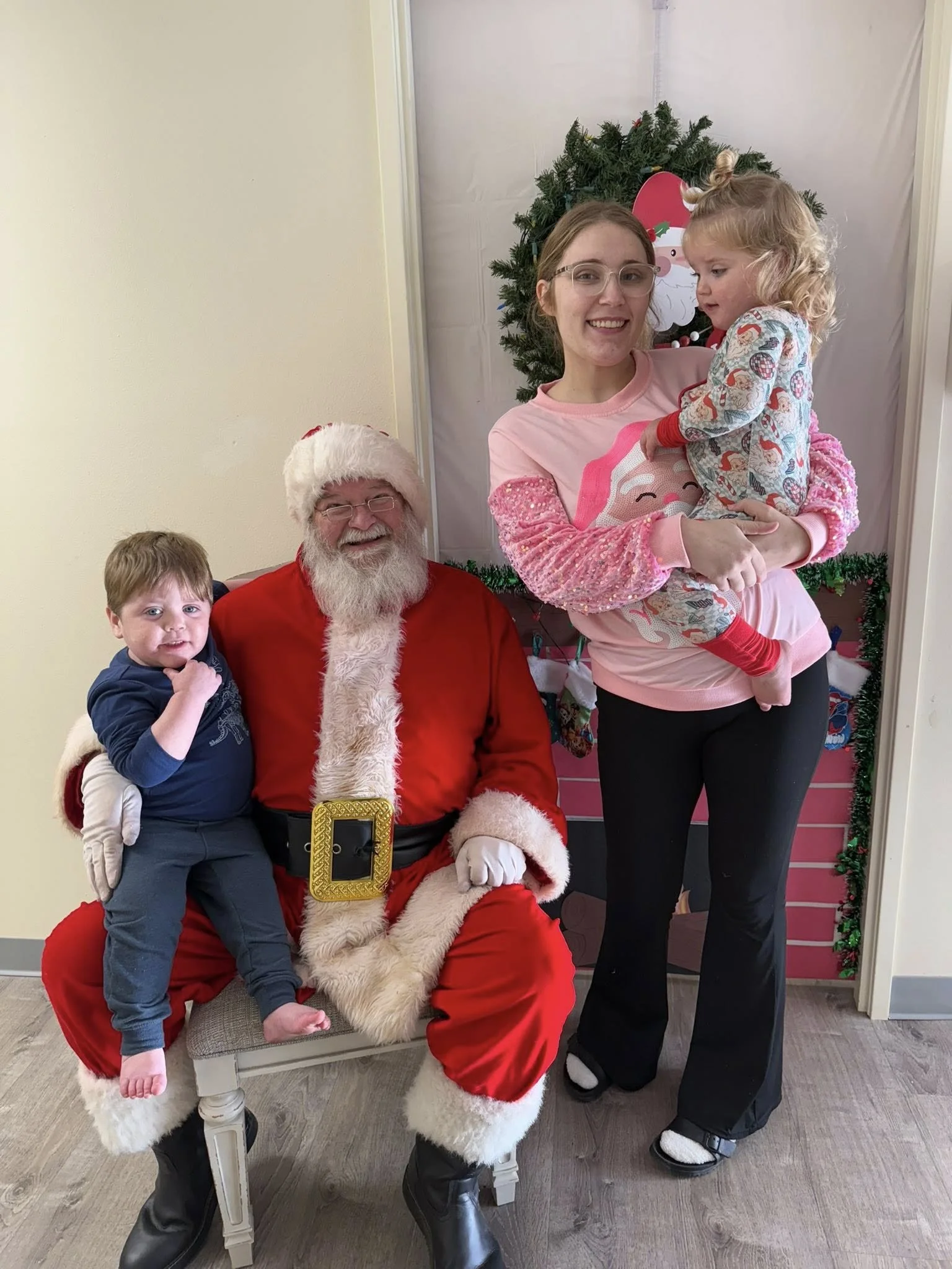 Jasper 2026 Jan Santa teacher and two kids.jpg