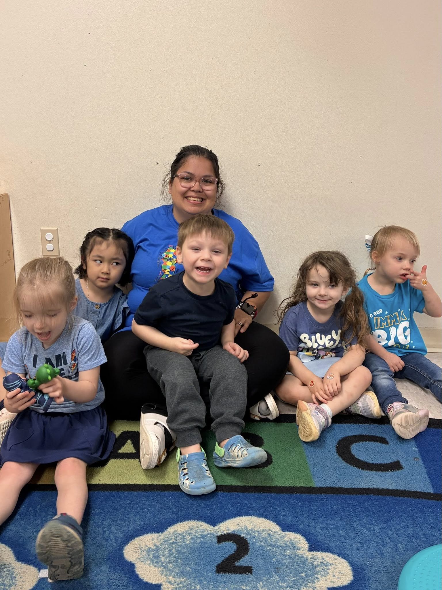 BV April 2026 Teacher with class on Autism Day.jpg