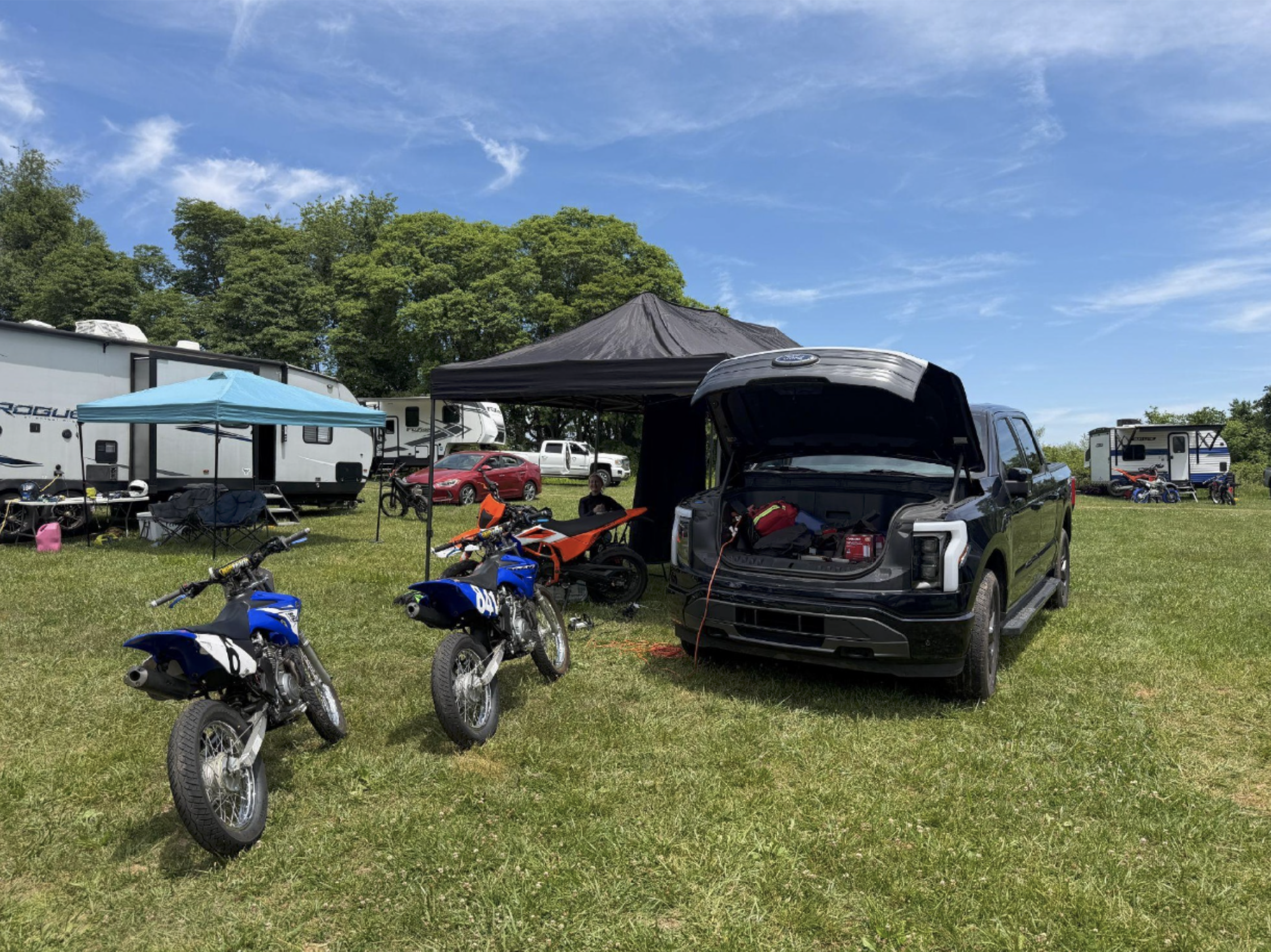 Ford Lightning with all of our tools and fans plugged into onboard power, helping to keep us cool on this 100-degree day