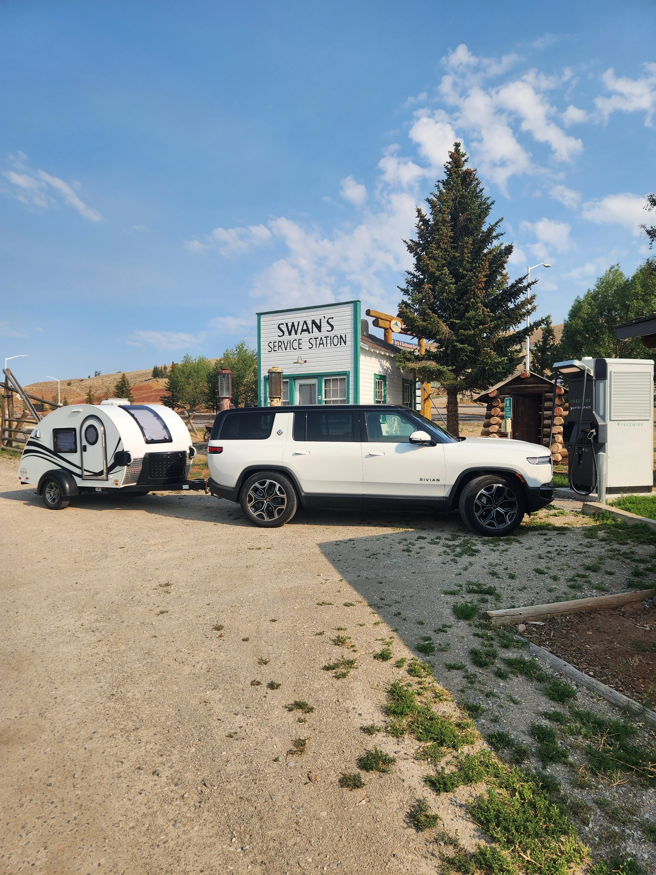 EV towing a teardrop trailer