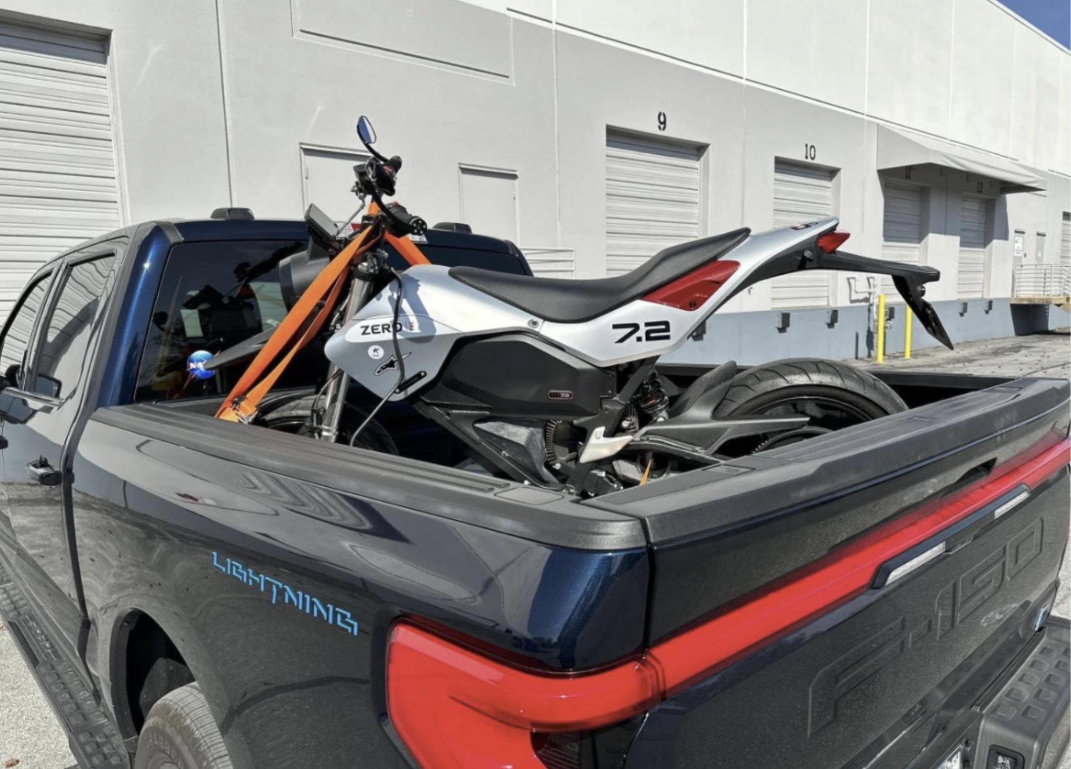 Zero FXE loaded up and charging in the bed of the Ford Lightning.