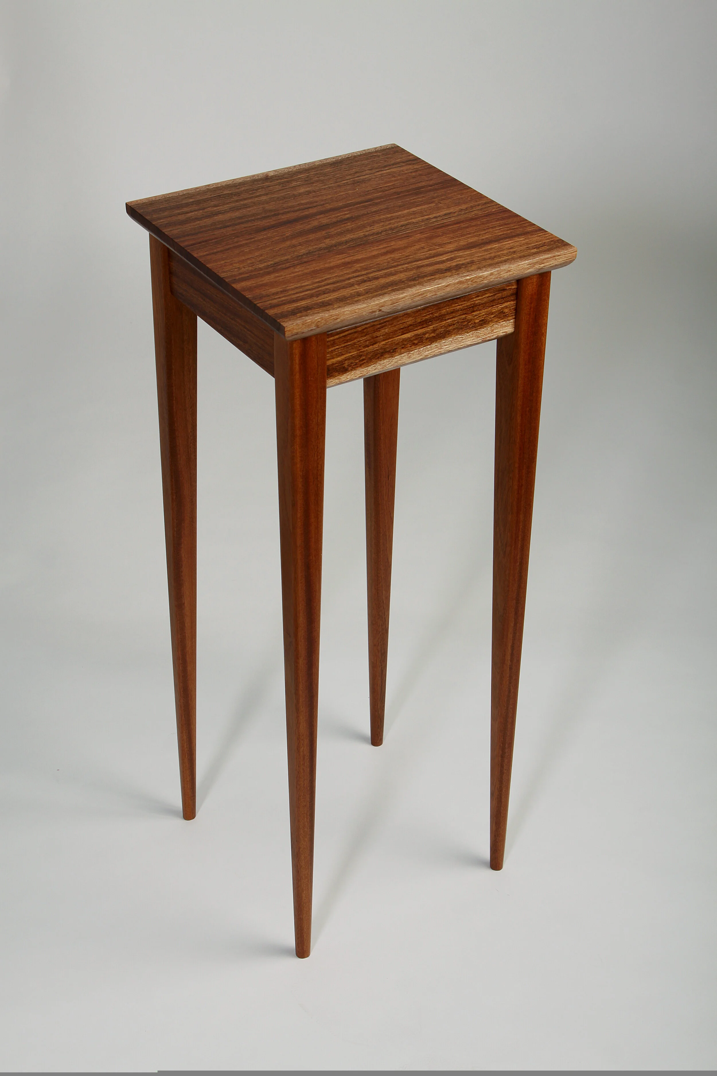 pottery display table, african sapele