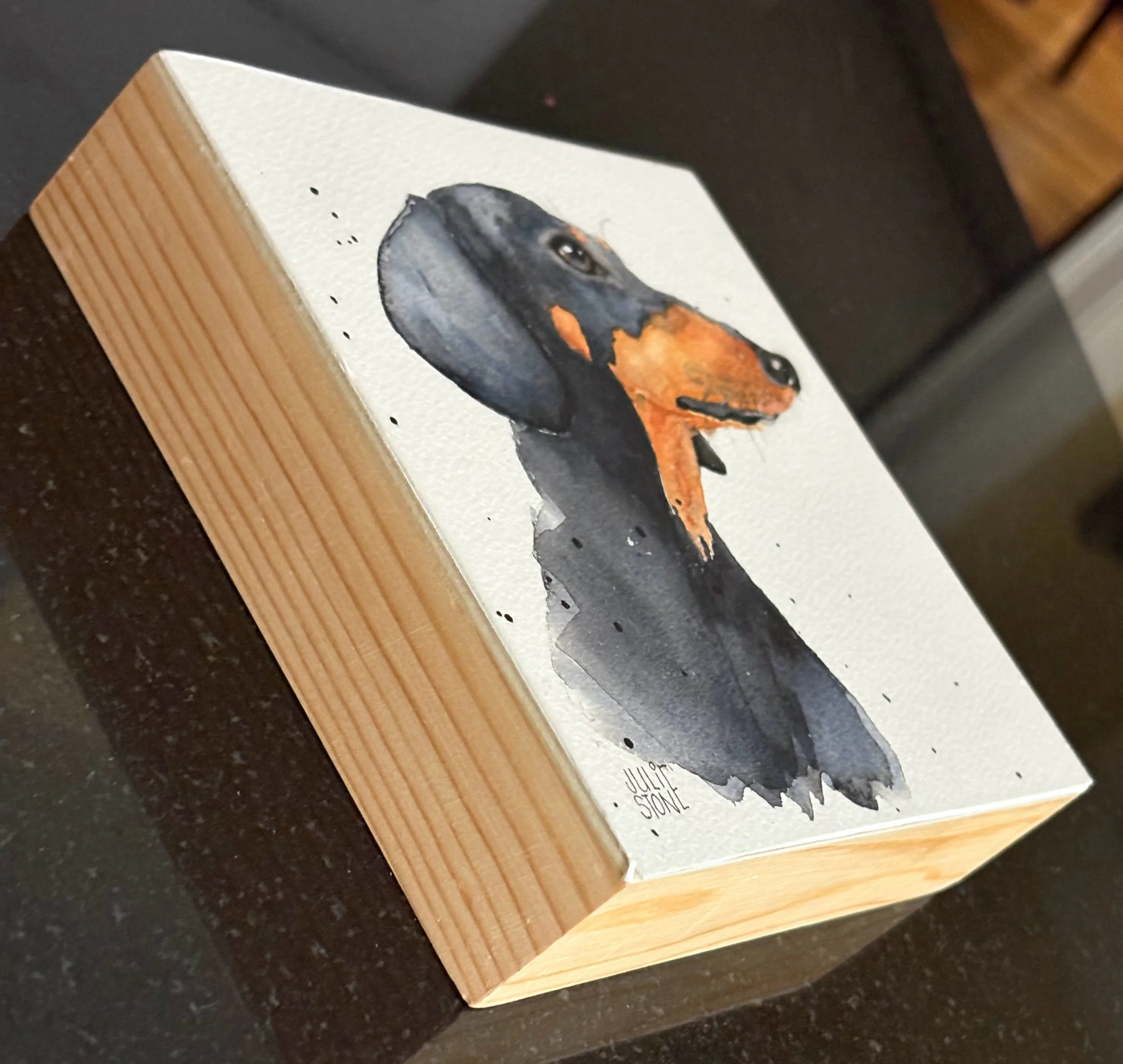 Mounted on wood and sealed with wax