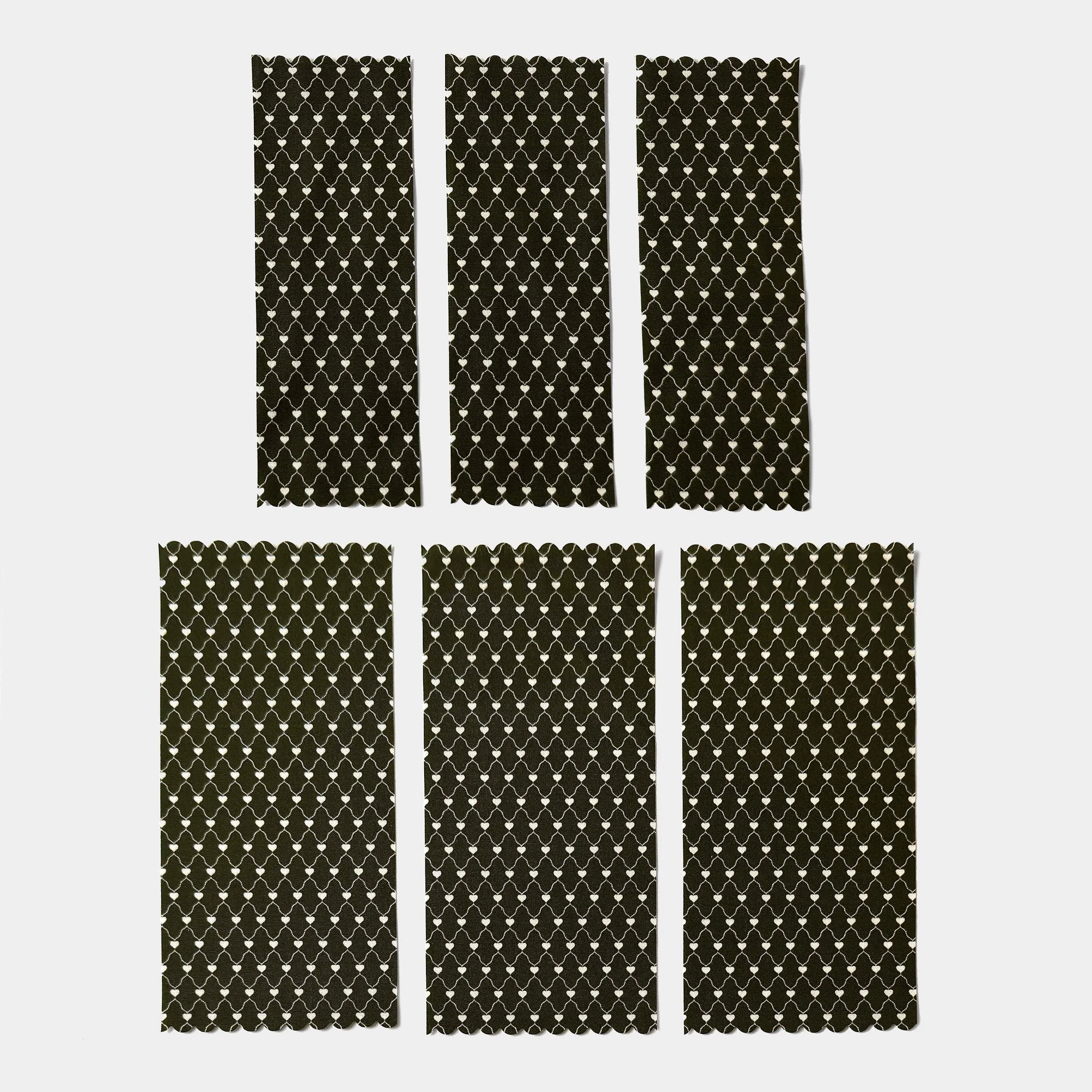 WaxingStripsBlack2_GreyBackground.jpg