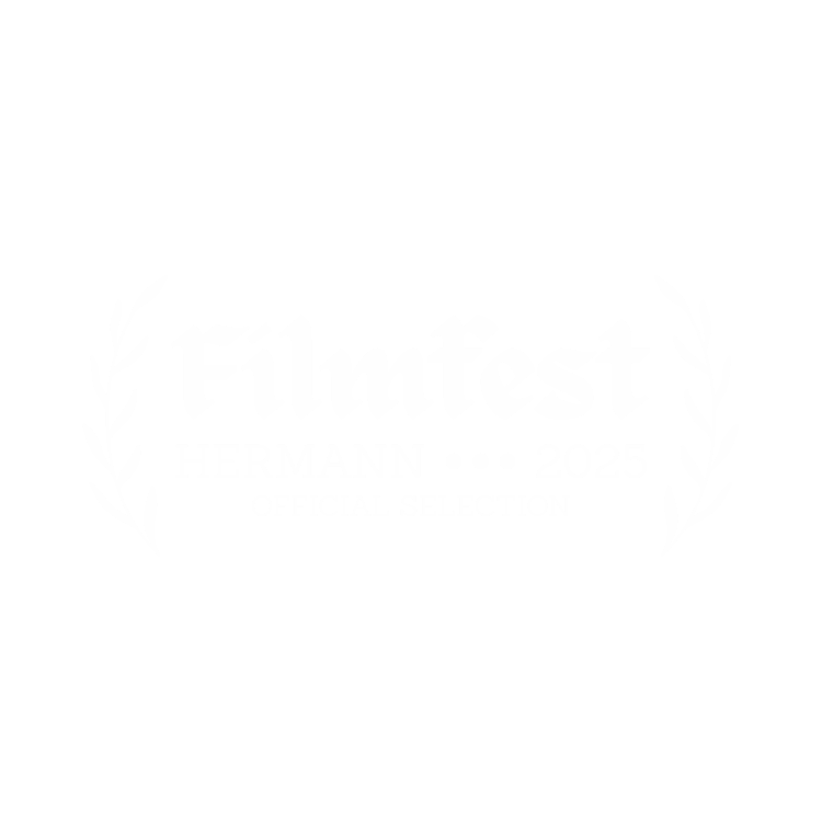 Black background with white text reading "Filmfest HERMANN 2025 OFFICIAL SELECTION" framed by laurel branches.