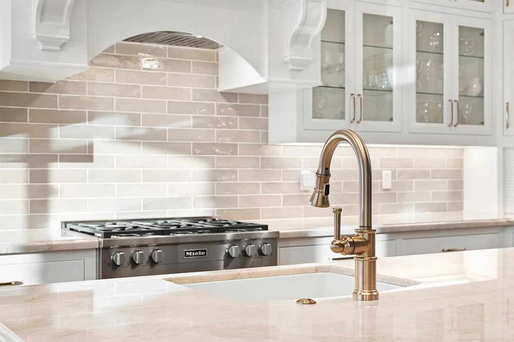 White and cream kitchen with quartzite countertops