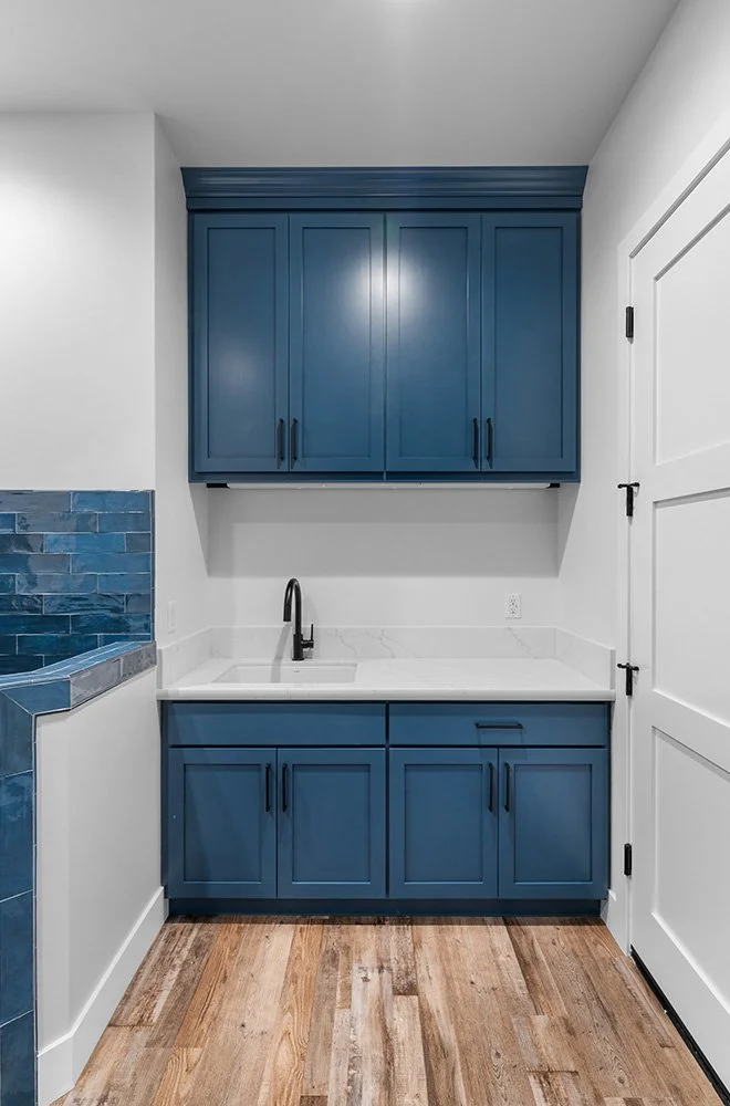 custom blue cabinets with white countertop