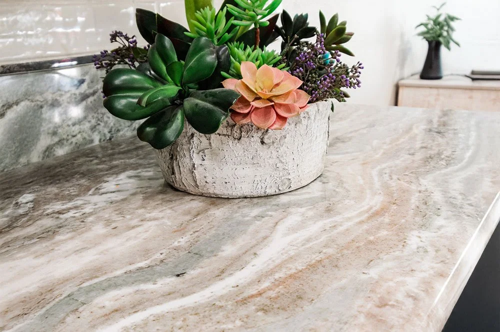 close up of dolomite countertops with succulents