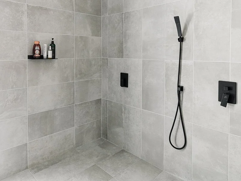 Ceramic tile shower installed by Ceramic Designs in bathroom remodel