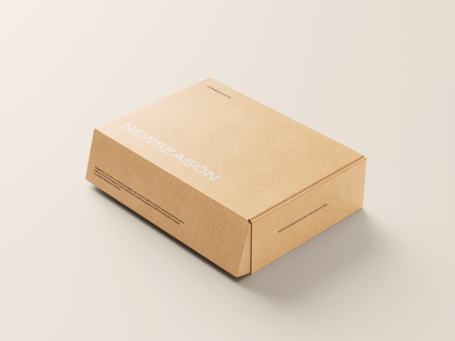Cardboard box labeled "New Season" on neutral background
