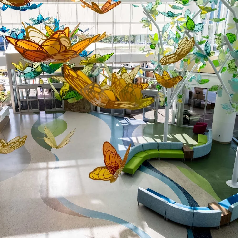 Colorful butterflies fill the entrance lobby of Arkansas Children's Hospital