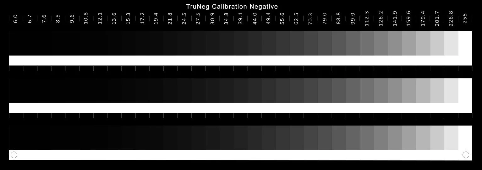 A grayscale calibration chart titled 'TruNeg Calibration Negative' with three horizontal grayscale bars and a color gradient at the top, labeled with numeric values