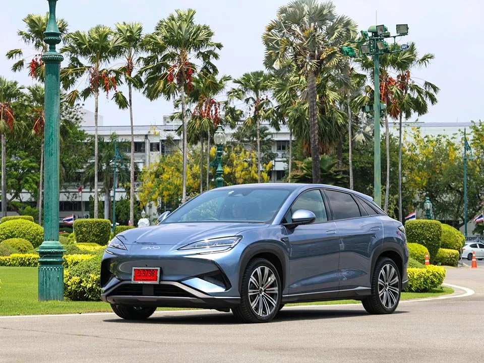 Prime Minister Anutin Charnvirakul arrives at Government House in a BYD Sealion 7 electric SUV during Thailand's 2026 fuel crisis