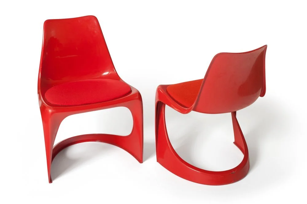 Two plastic geometric chairs facing away from one another with a professional white background taken by Nick Matthews who is an amazon product photographer