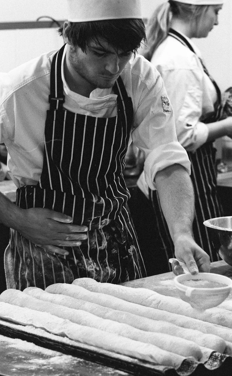 Professional chef working in kitchen at Michael Caine's academy in Exeter
