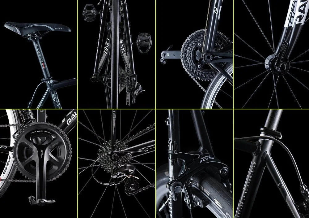 Close-up shots of high-end bicycle components, including gears, chain, wheels, frame, and crankset, mounted on a black background.