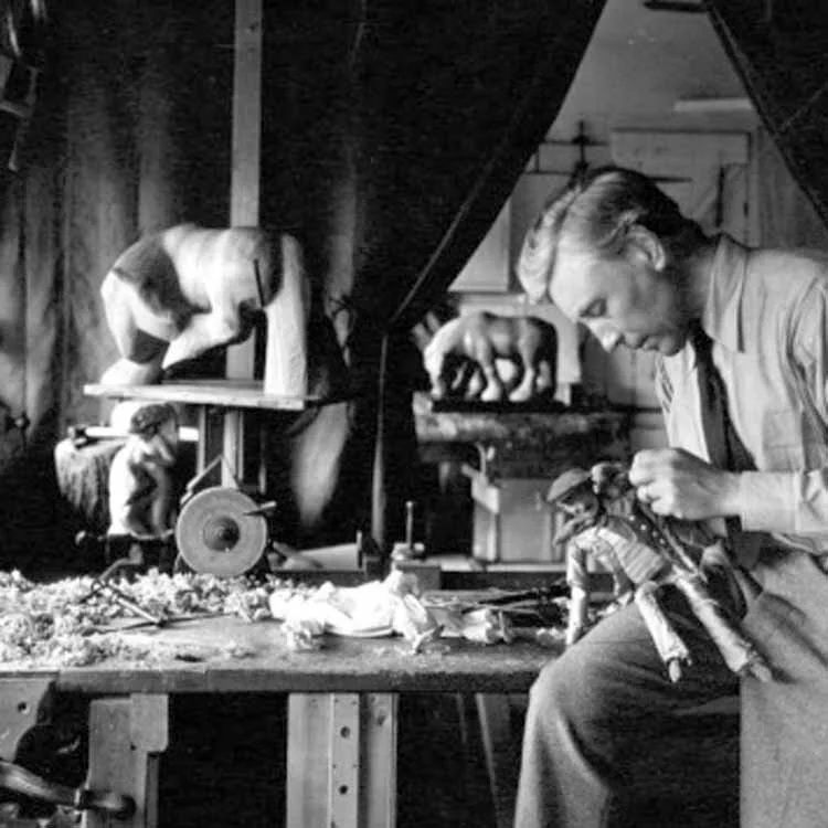 William in his Oakridge workshop carving a puppet, photo by his assistant Catherine Cobb