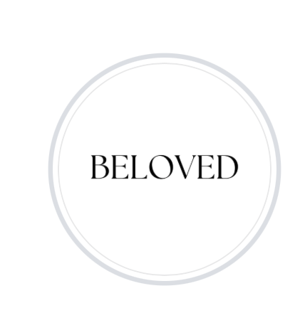 A white circular card with gray outline displaying the word 'BELOVED' in black uppercase letters.