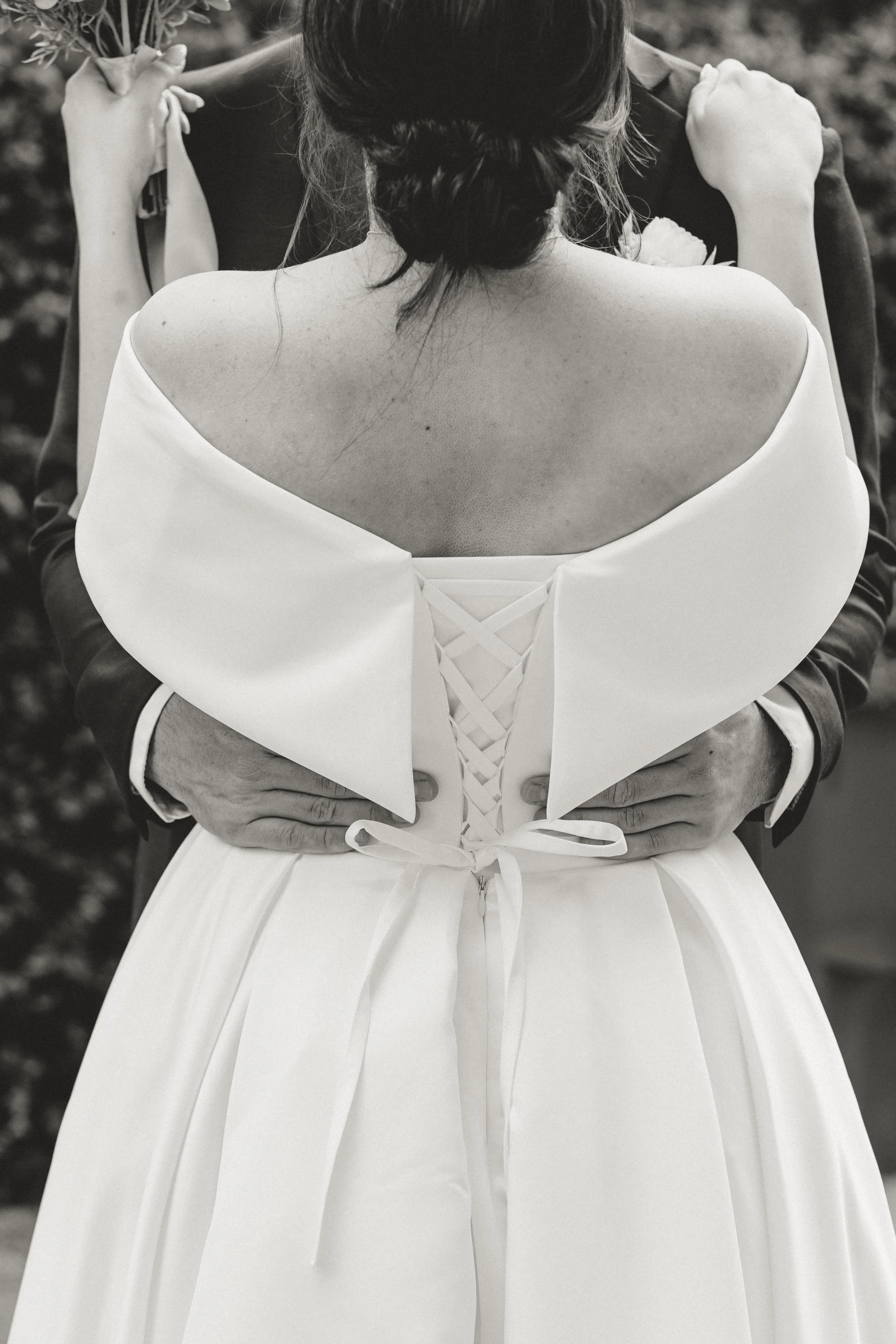 Intimate Charleston wedding moment with bride and groom embracing