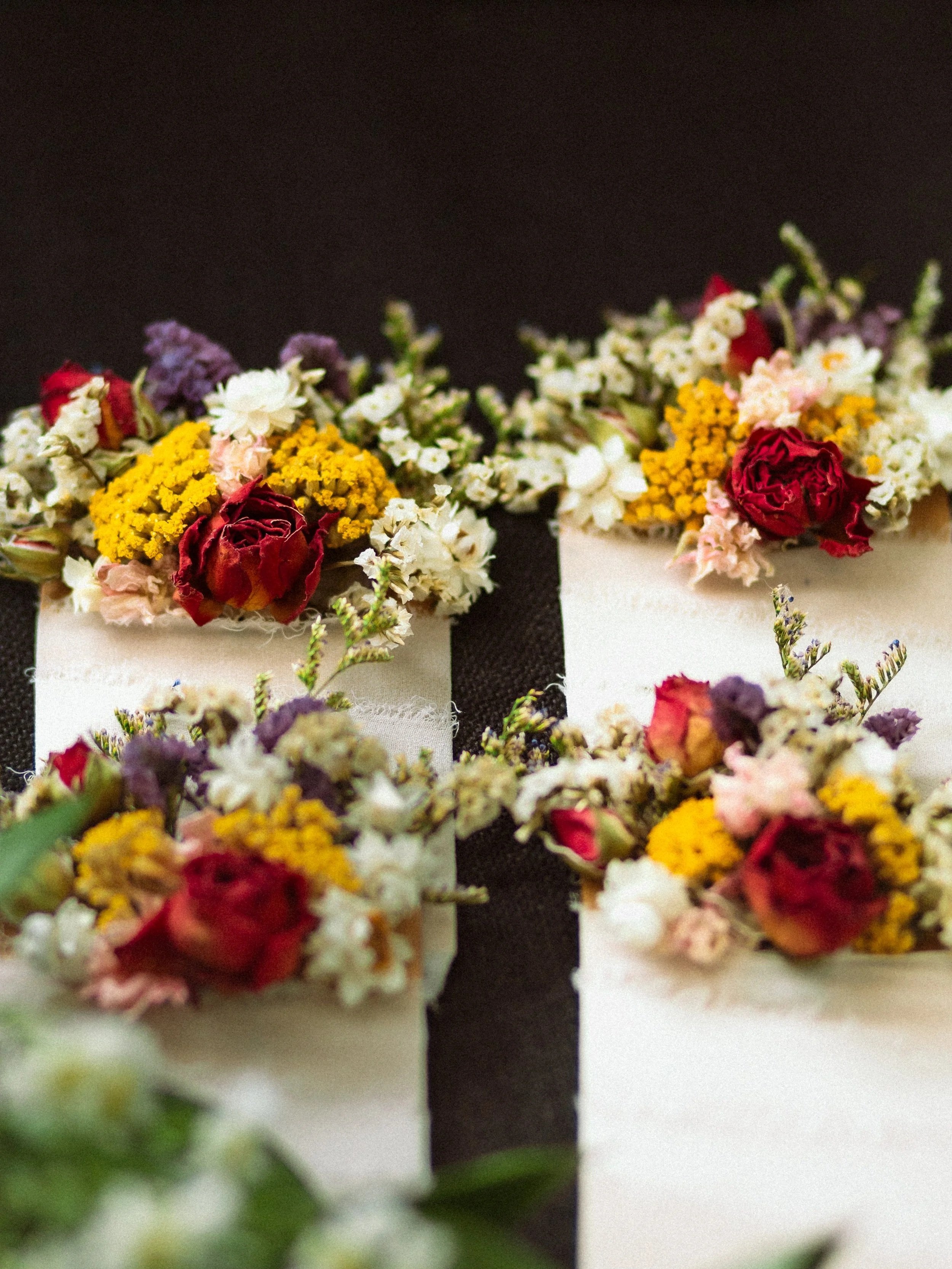A beautiful floral flat lay and major detail of the wedding, the cake. 