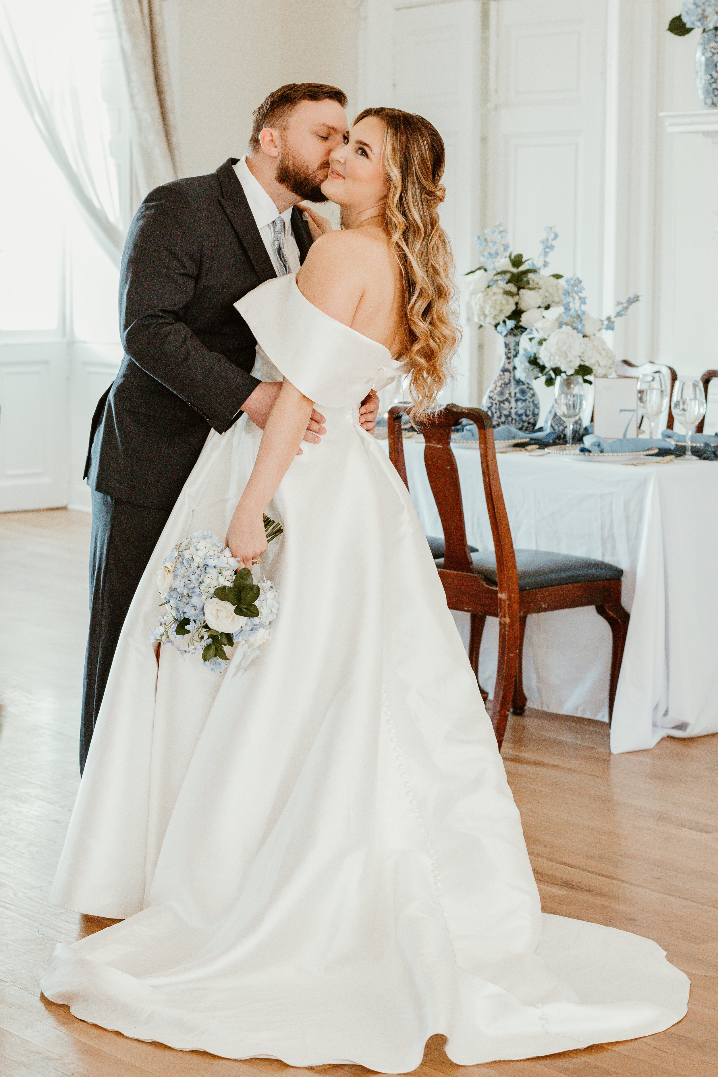 Bride and groom embracing during an intimate Charleston SC wedding — Charleston elopement and wedding photography by Marly Viviana Photography