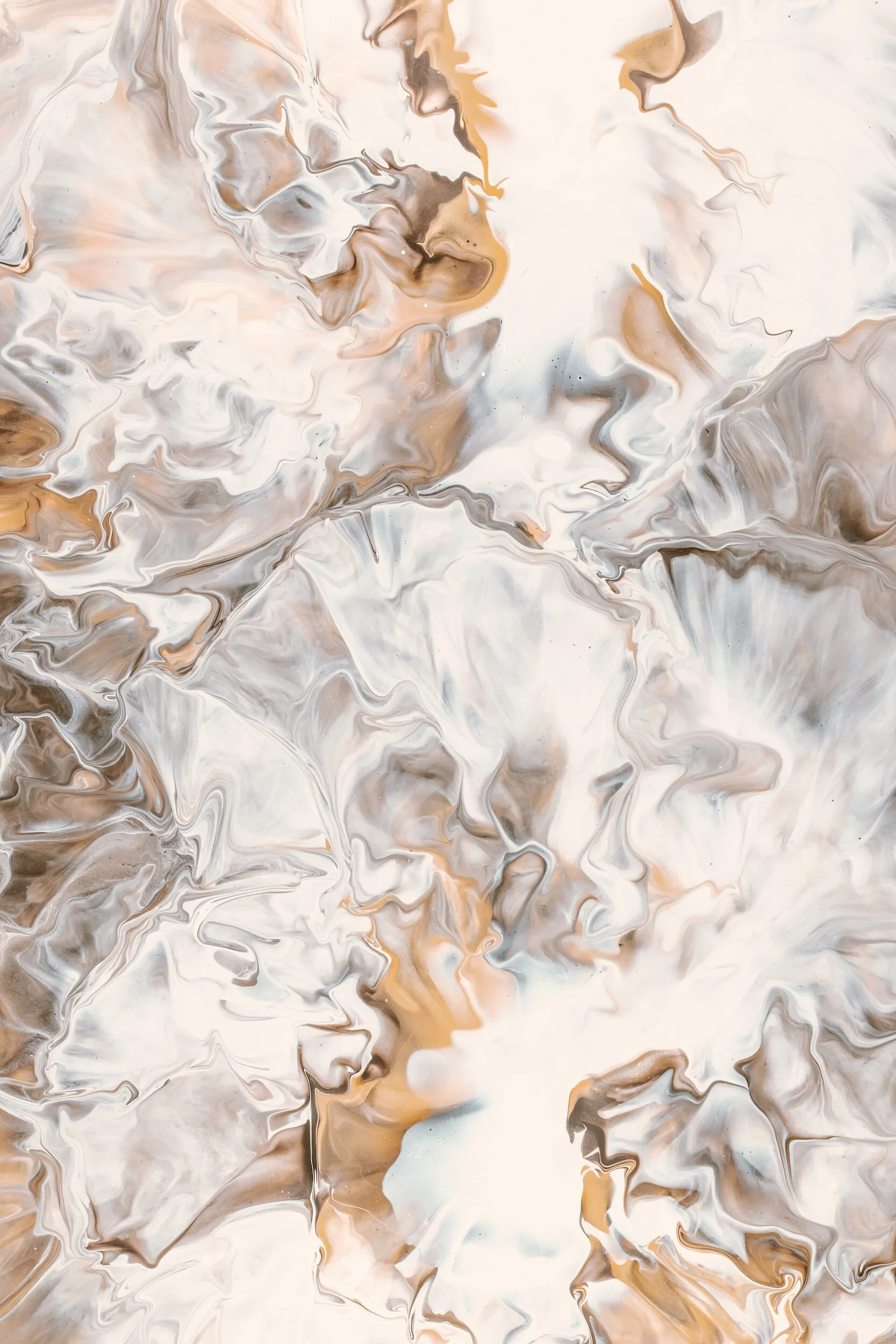 Abstract swirl of white, beige, cream, and light brown colors with fluid, marbled patterns.