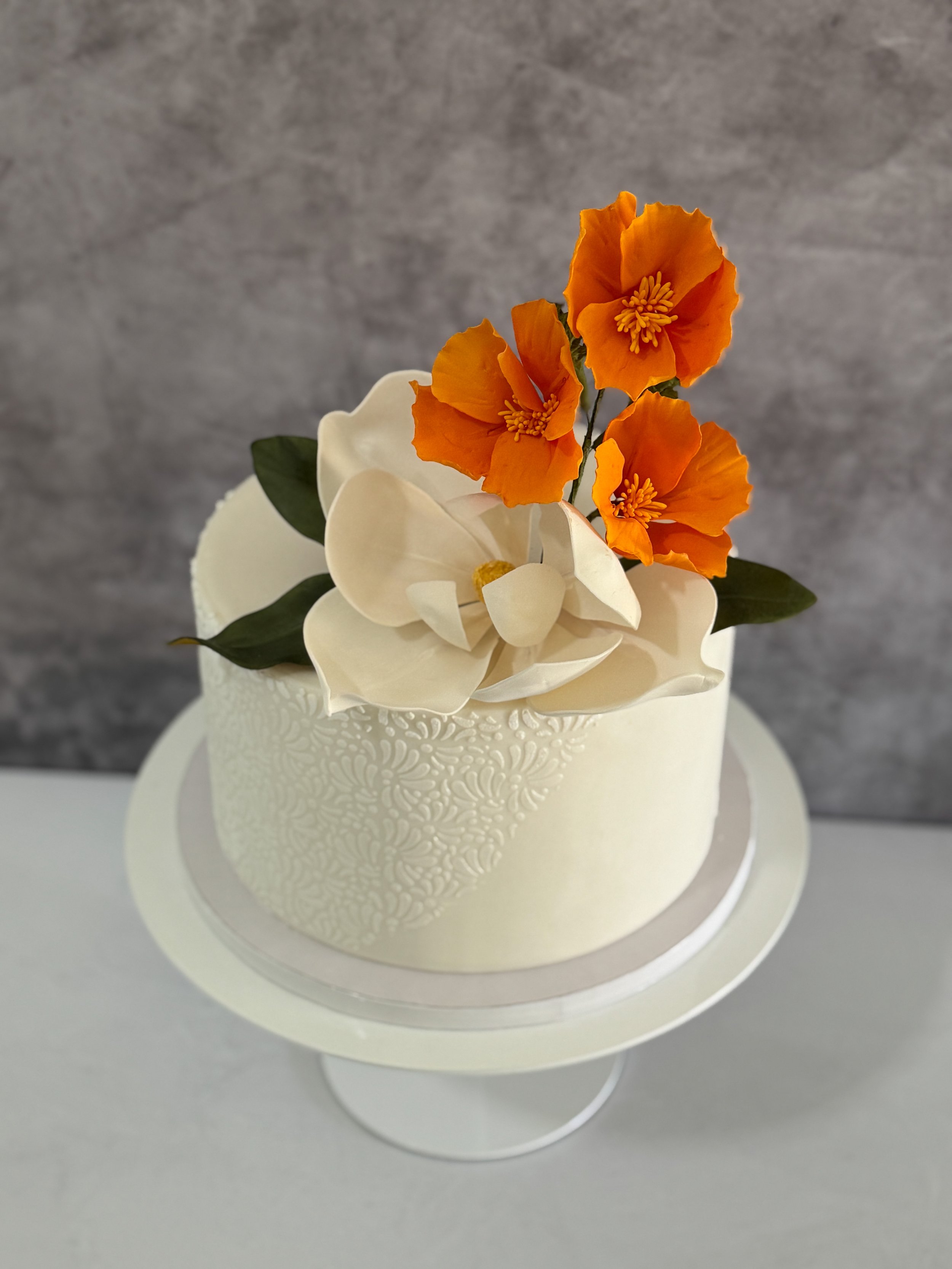Poppies and magnolia cake.JPEG