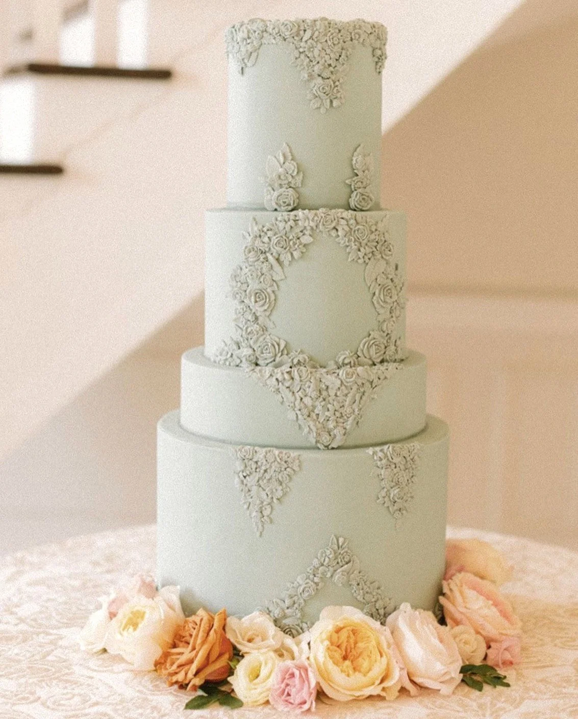 Teal Bas Relief with Flowers.jpeg