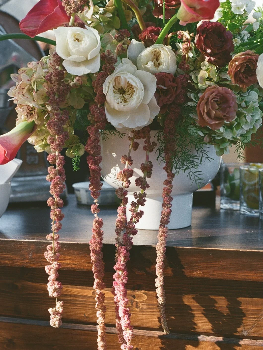 My sweet bride, Alleah, wanted a statement piece for the bar with accents of burgundy. This was the result and I love it!!

coordinator: @yourqrwedding 
venue: @quailranchevents 
photo &amp; video: @madlovemedia_ 
florist: @brookebloom.co 
catering: 