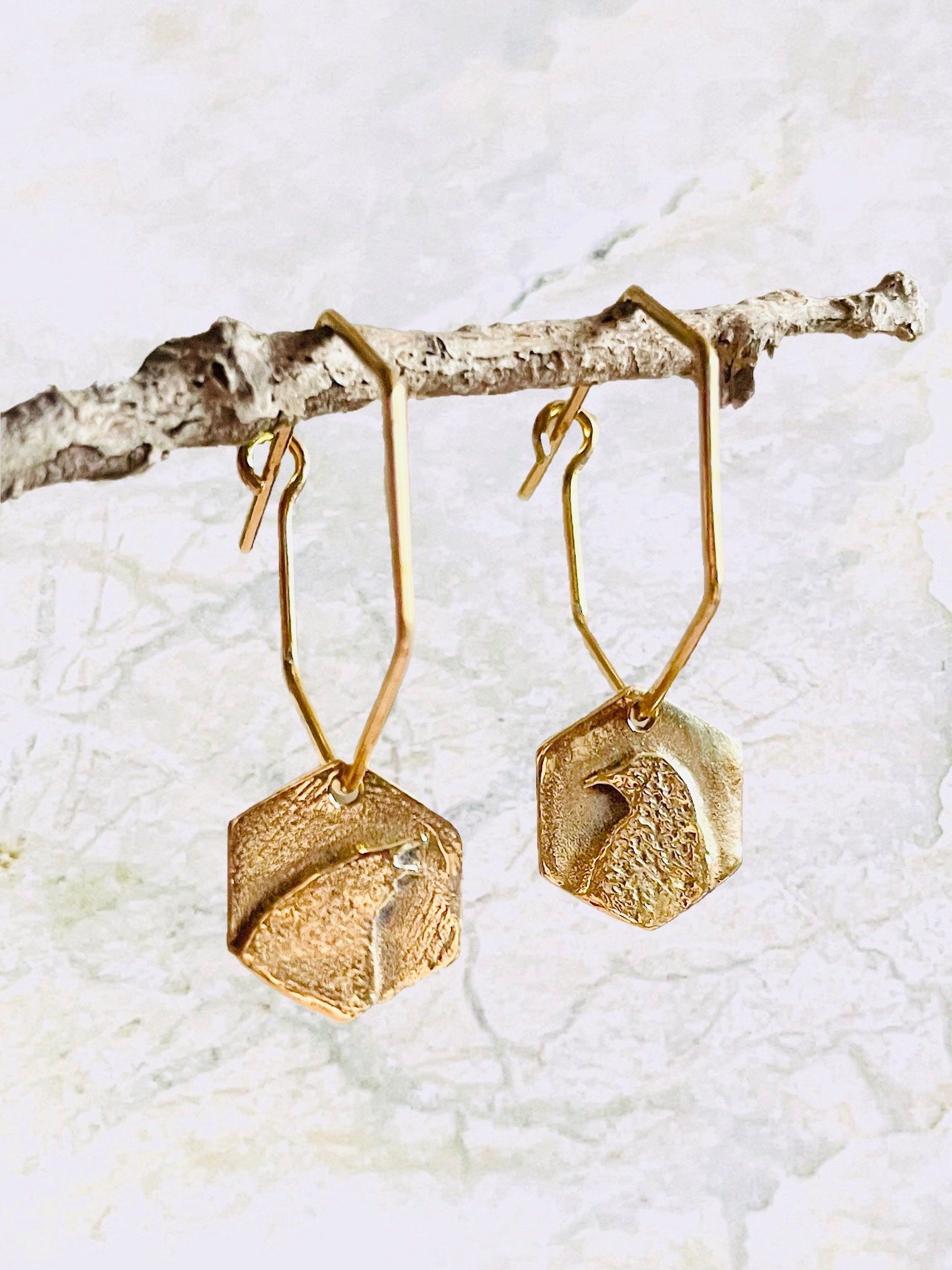 bronzecrowpairearrings.jpeg
