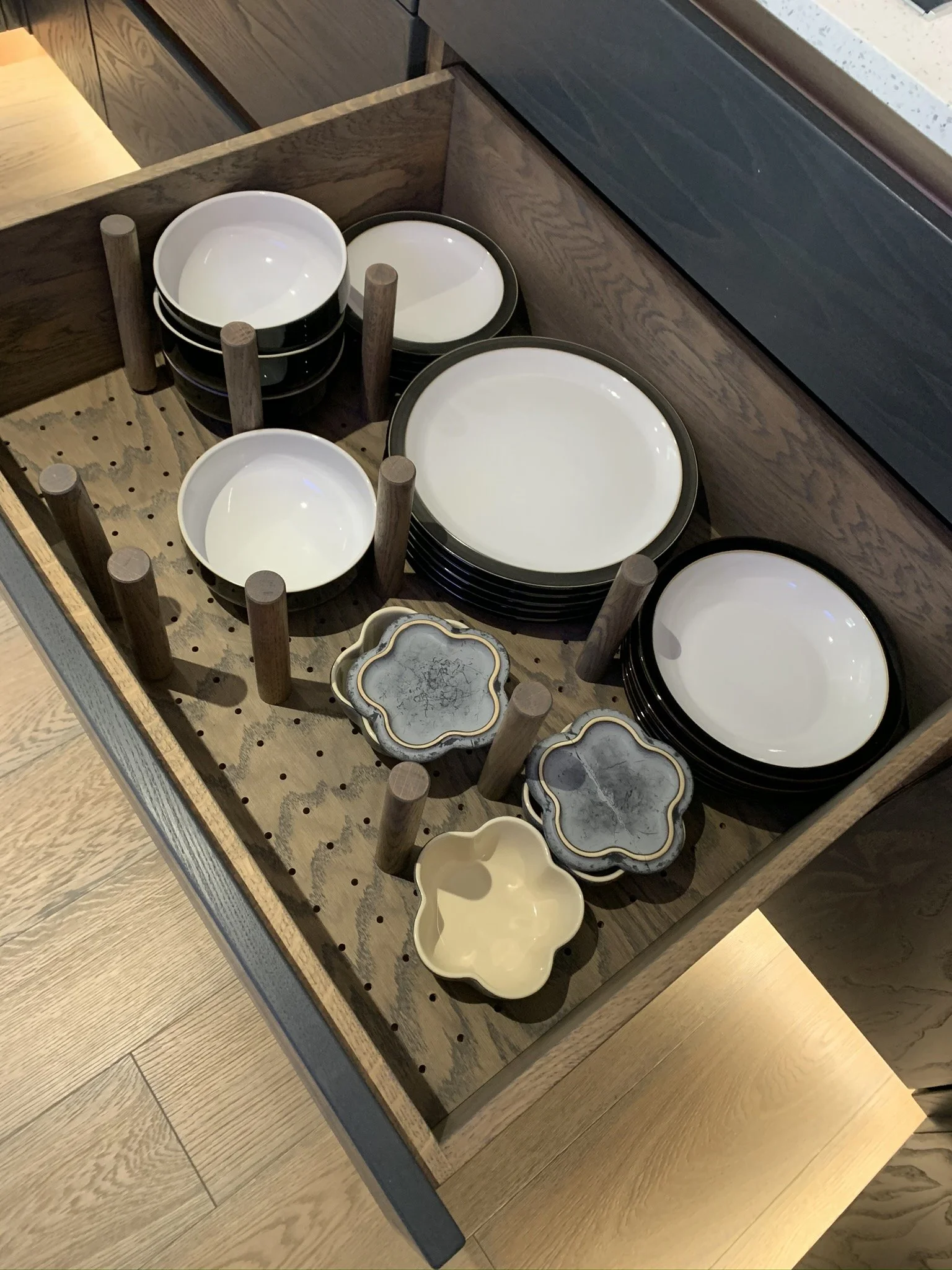 Marc Smith bespoke kitchen drawer with inserts for crockery storage. 