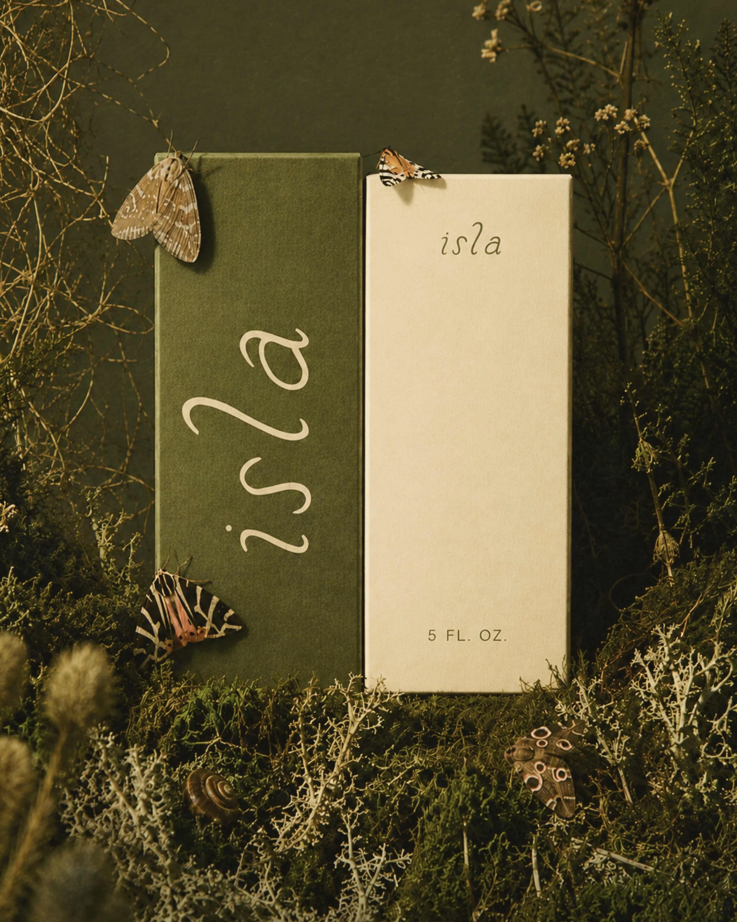 Luxury botanical packaging using featuring hand drawn typography from By Hand Design's Isla font alongside modern digital typography to create an elegant, memorable brand identity with handcrafted character.