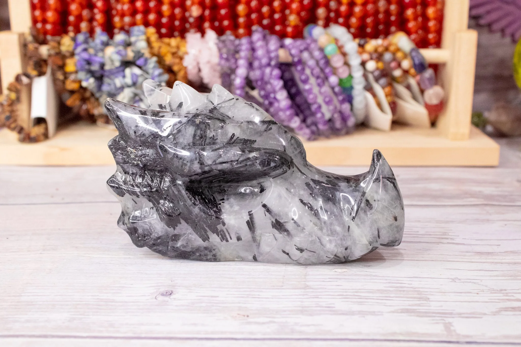 Tourmaline in quartz dragon carving