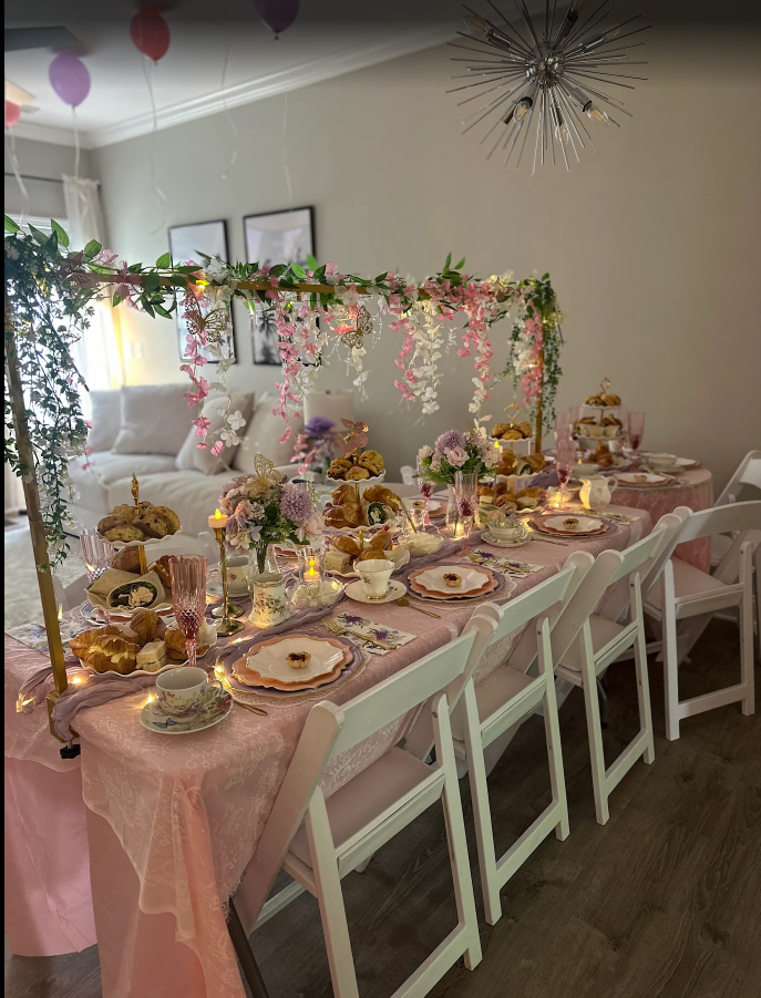 indoor table and chairs with pink decor