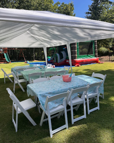 outdoor party tent with tables & chairs