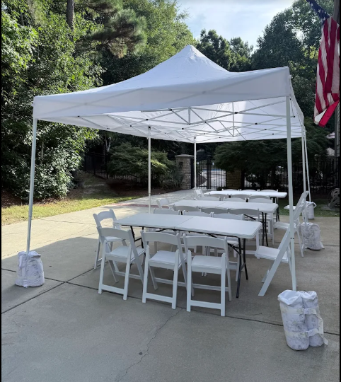 10x20' pop up tent with 3 6-ft tables