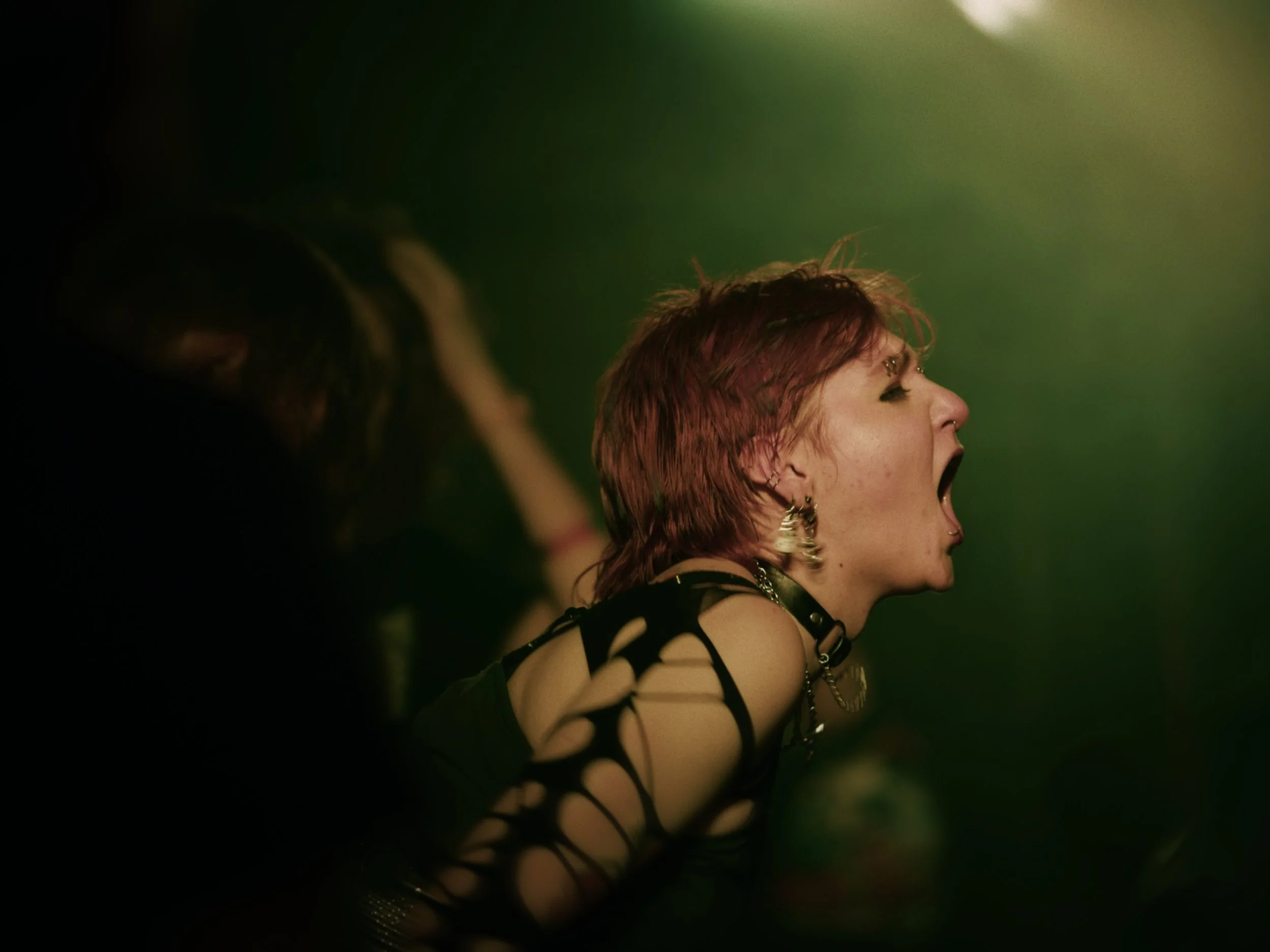 Concert goer having a fun time at a Scorched Waves show. 