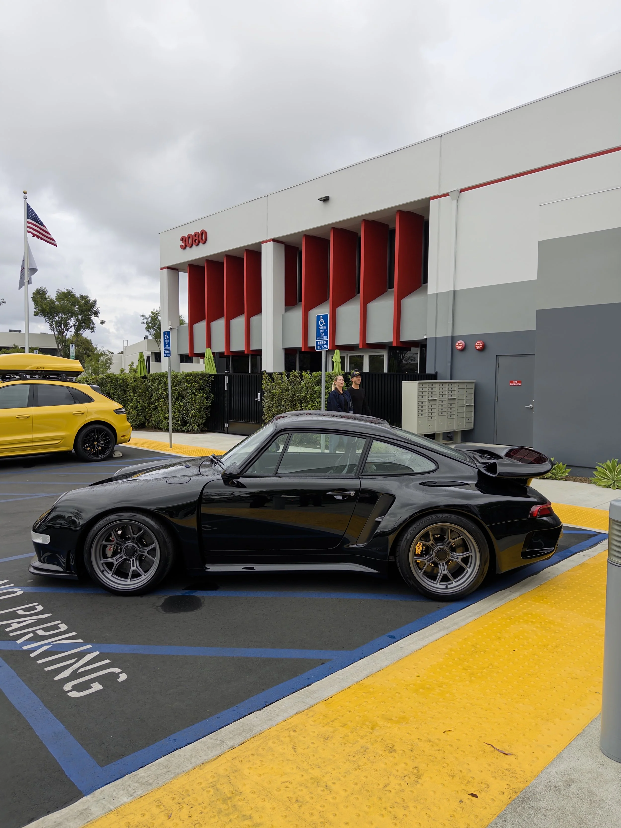Turbo Florio 5 — 1996 Gunther Werks  911 Turbo (993), Dark Necessities welcomes attendees to the Air|Water After Party. Side view and covered in rain droplets. — #TurboFlorio5