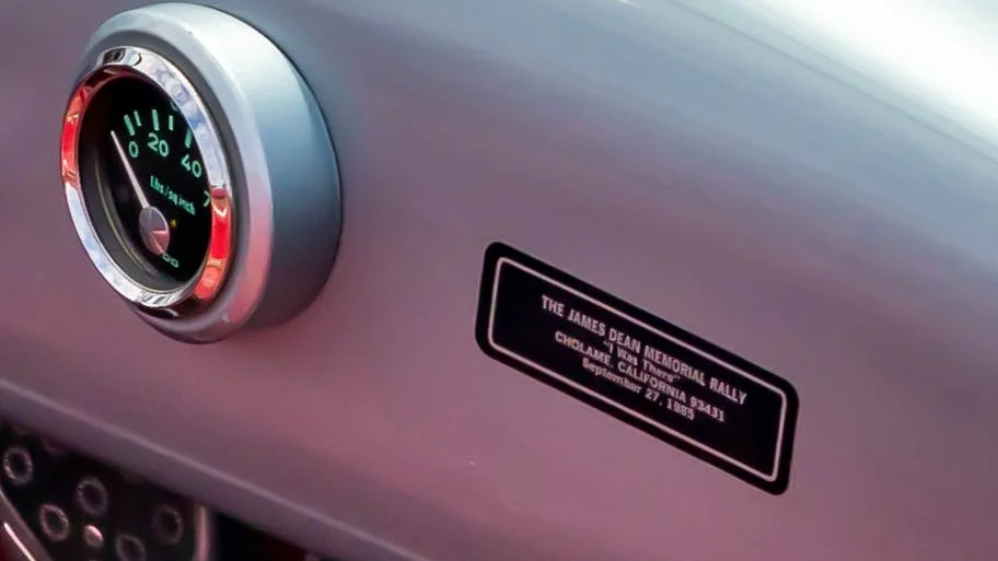 Air | Water 2025 — Orange County Fairgrounds — A close-up detail shot of a commemorative plaque for "THE JAMES DEAN MEMORIAL RALLY" held in Cholame, California on September 27, 1985. — car show, detail shot, outdoor — April 26, 2025