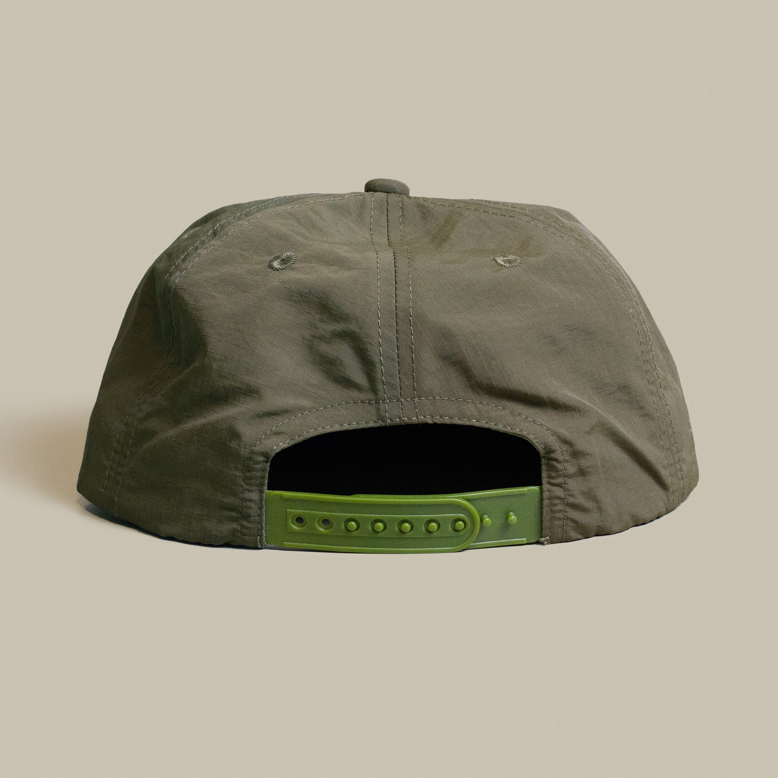 jay-fletcher-montana-brown-trout-hat-forest-back.jpg