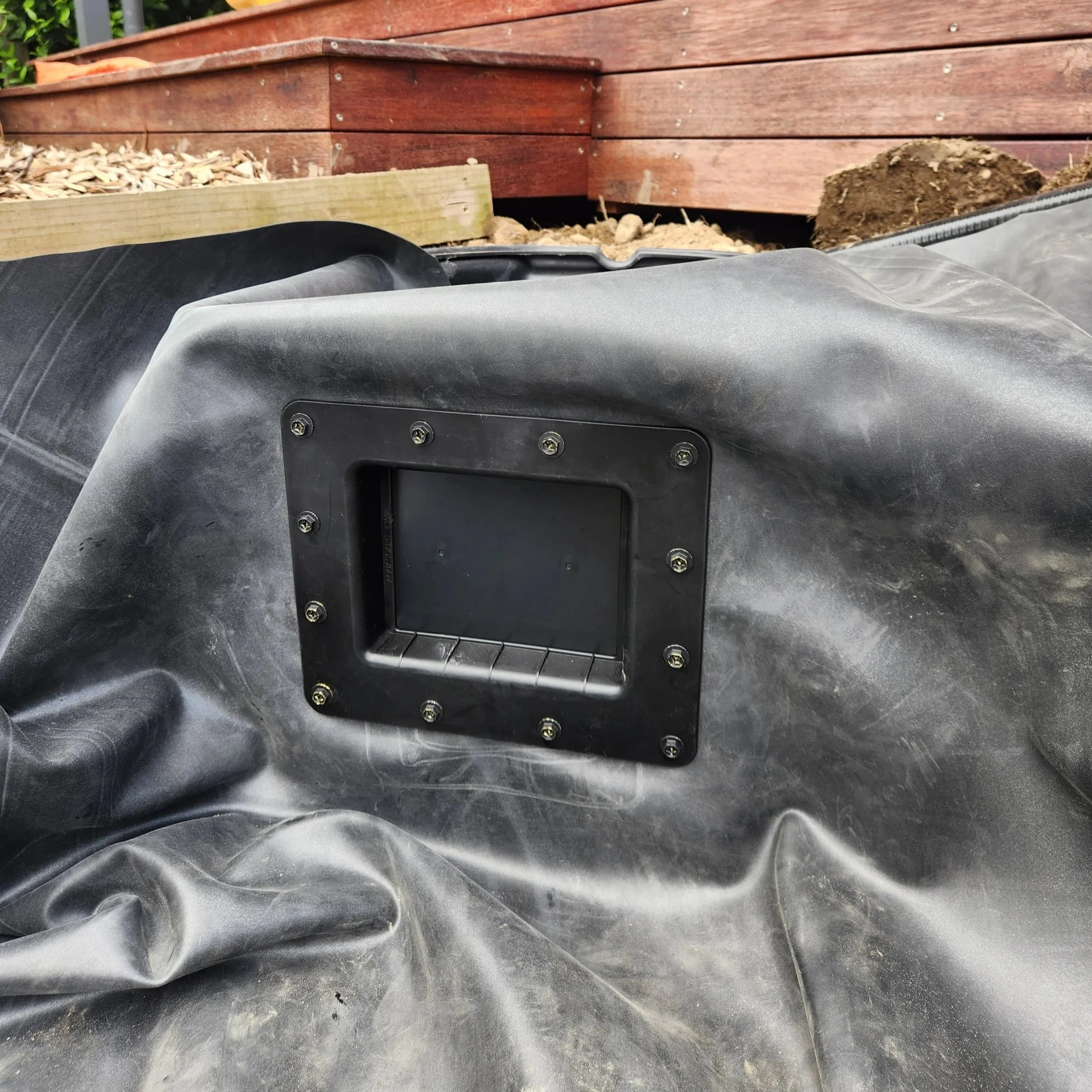 EPDM rubber liner laid with Aquascape skimmer box bolted through — eco-system pond build, Southern Waterscapes Ltd Canterbury