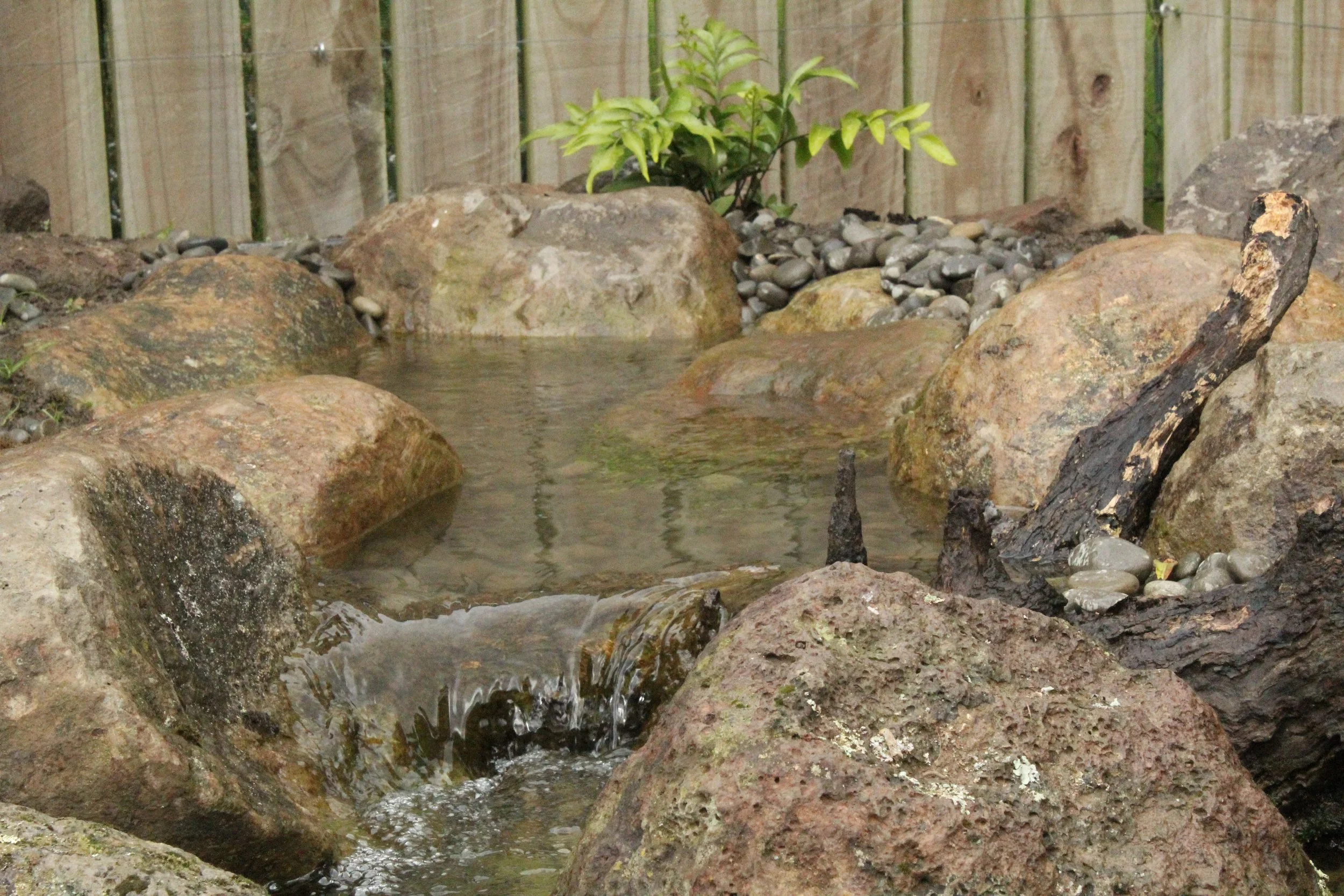 Compact pondless waterfall with Oxford boulder and driftwood, Darfield, Selwyn — Southern Waterscapes Ltd