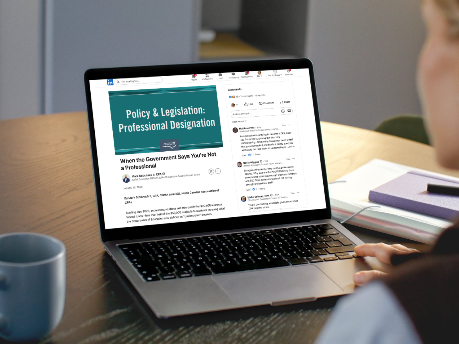 A woman reads an article called "Policy and Legislation: Professional Designation" on a laptop.