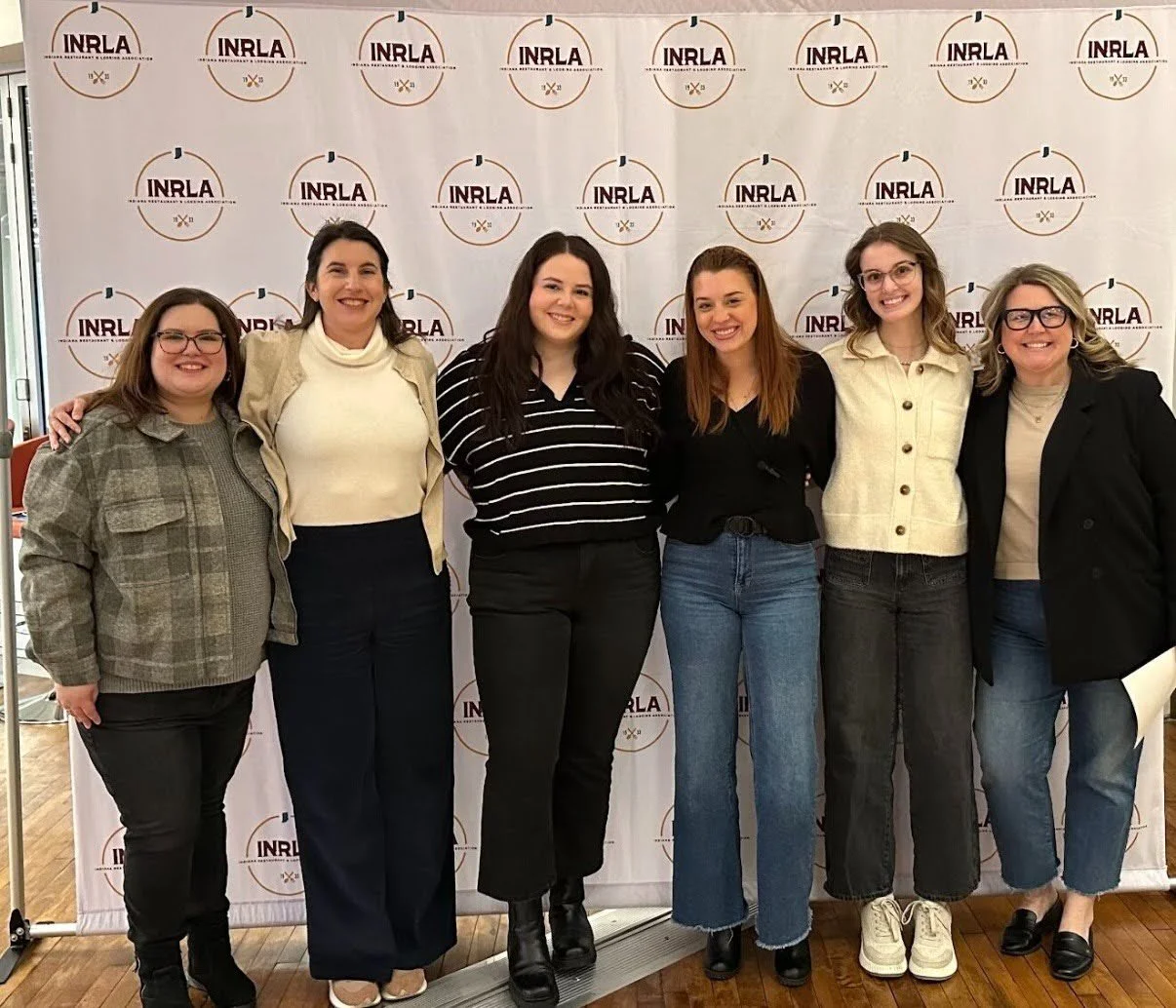 Six Green Loop employees at the Devour Winterfest Cocktail Competition