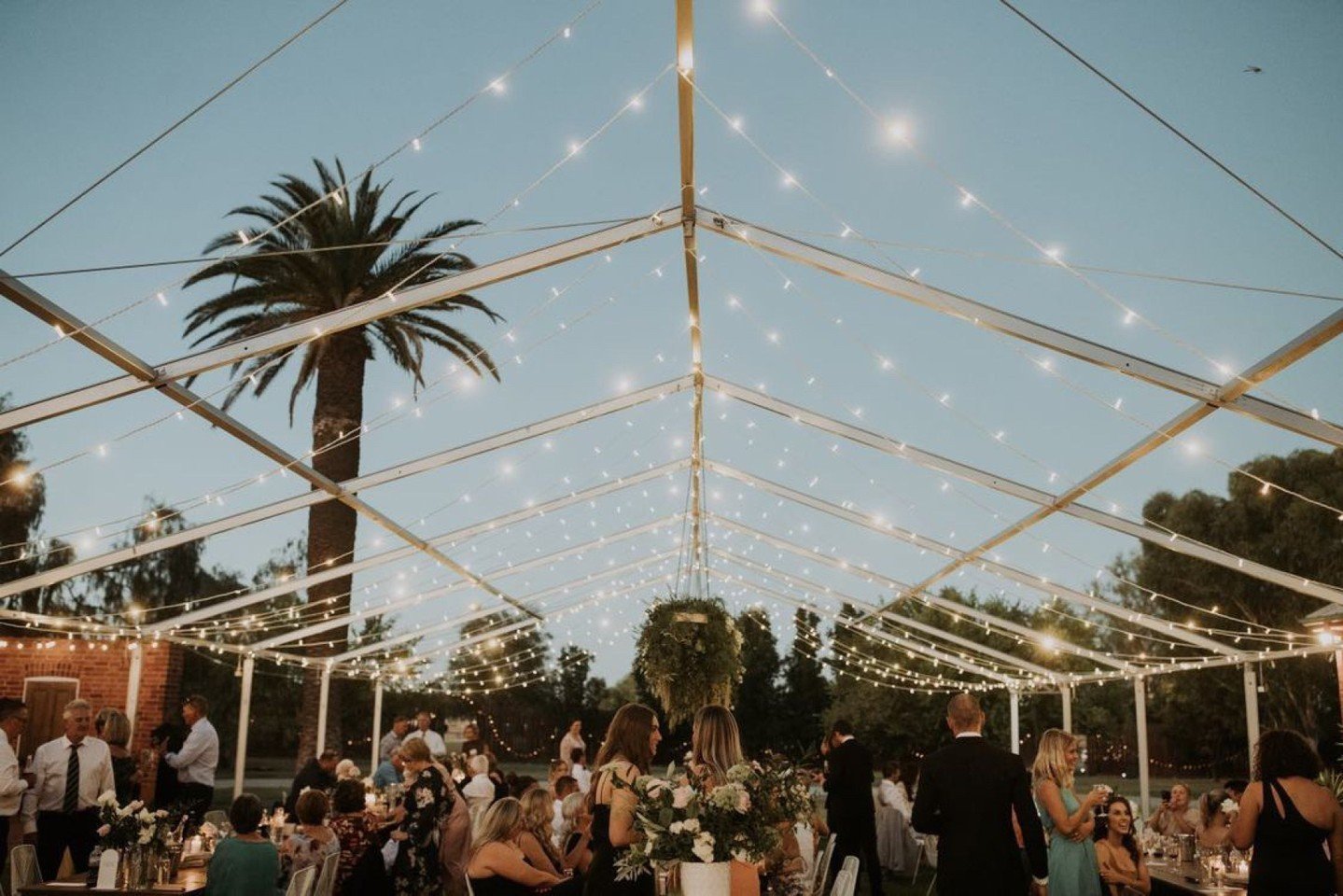 Fairy lights add the perfect touch of magic to this open air marquee wedding!!

Dinning under a canopy of twinkling lights and stars at the beautiful @moirastation, surrounded by your loved ones, sounds like the perfect evening!

Venue: @moira_statio